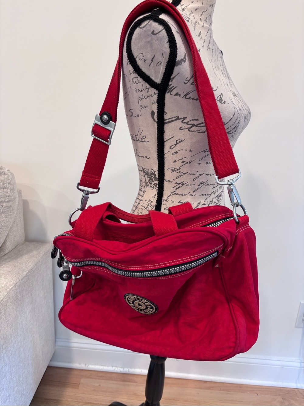 Kipling red nylon shoulder and travel duffel bag